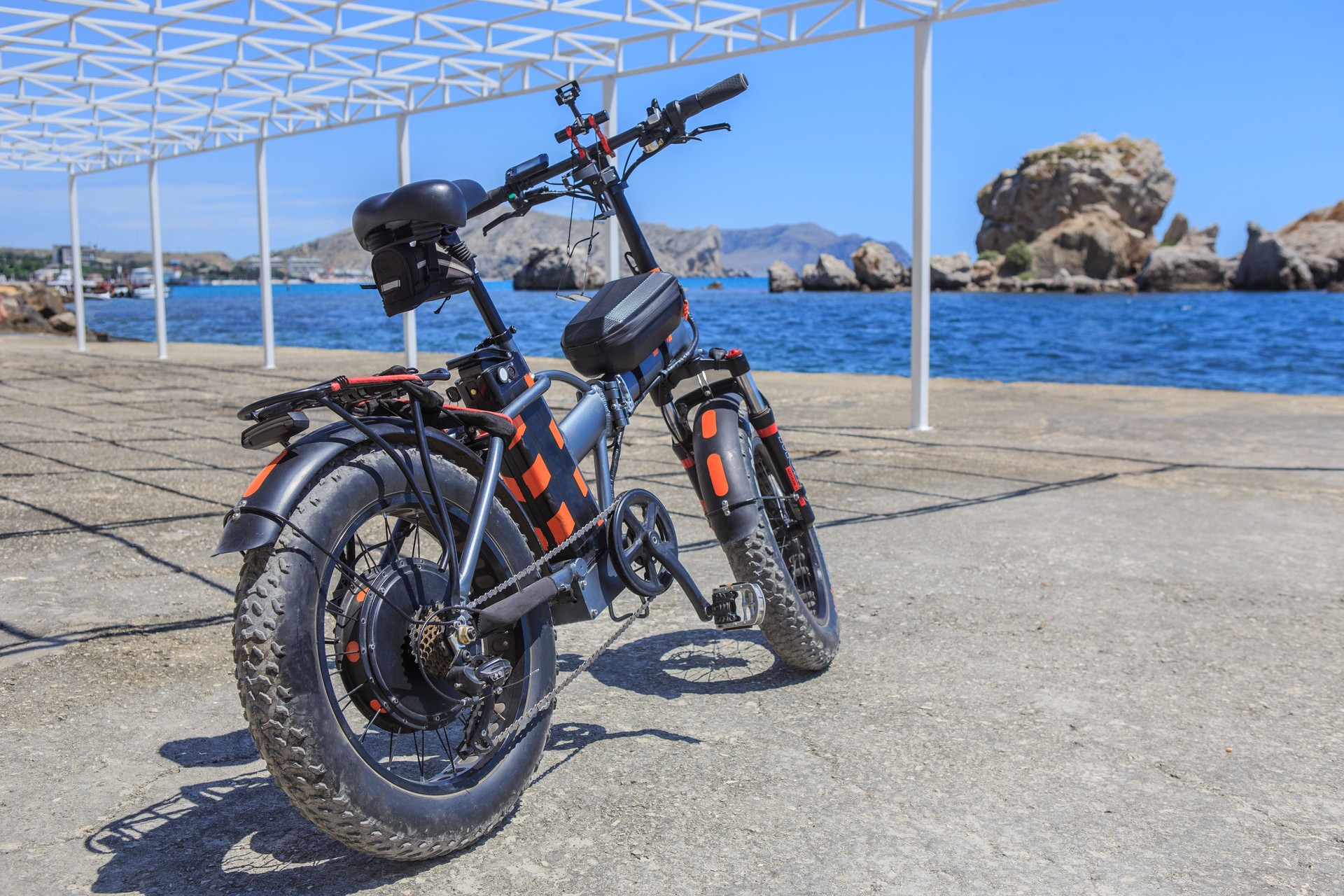 Electric bike on the beach by the sea